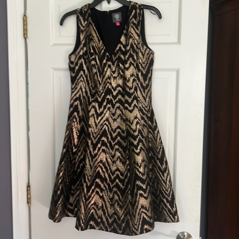 Vince Camuto fit and flare black and gold cocktail dress. Size 2